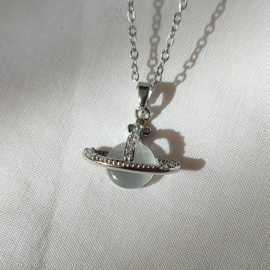 گردنبند زحل مات با سنگ سوارسکی